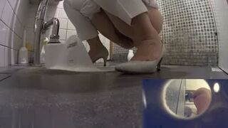 beautiful women peeing in the toilet