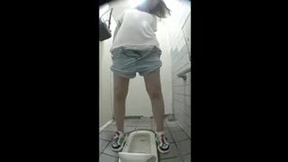 15385506 Looking into the Japanese style toilet of beautiful women from the front