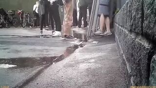 Girl pees her pants outside