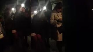 The Girl in White Shorts is Close to Losing it Waiting in Line