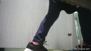 Sneak shot of women's restroom in shopping mall 22