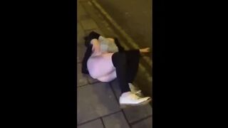 Drunk blonde falls down trying to piss