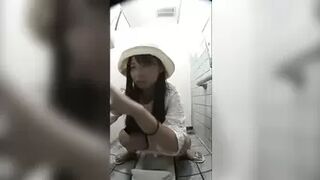 huoshiruogirlwc Young women crouching in a Japanese style toilet