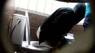two girls- one of them pees
