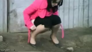 Voyeur watching woman pee