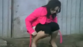 Voyeur watching woman pee