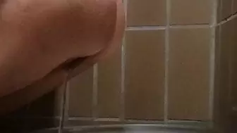 Peeing and wiping, front seen