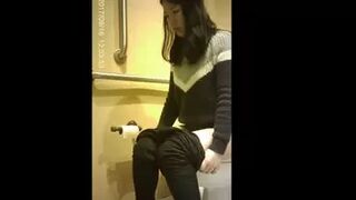 Peeping in the ladies toilet