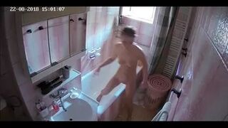 Hidden cam beauty takes a shower