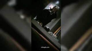 Voyeur front view in women’s restroom of Chinese malatang shop