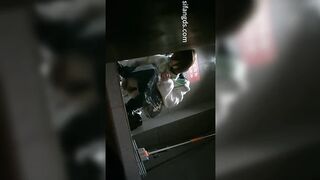 Voyeur front view in women’s restroom of Chinese malatang shop