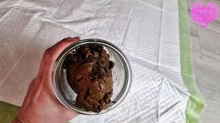 Kitty Skatt - Filling the jar for storage