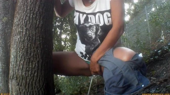 Girl Pulls Panties Aside to Piss