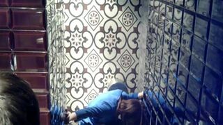 girl with friend uses toilet
