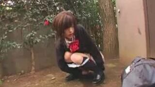 Japanese schoolgirl peeing in public