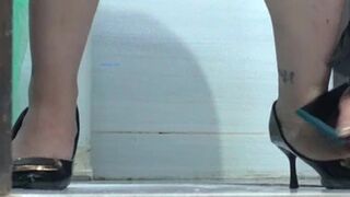 Woman pee in the restaurant bathroom